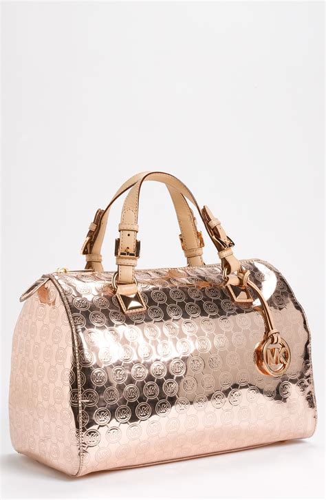 michael kors rose gold shiny pouch|michael kors handbags sale.